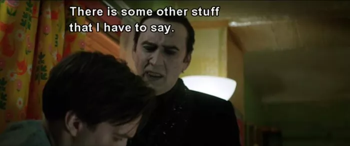 Renfield (Nicholas Hoult) cowers and says to Dracula (Nicolas Cage), "There is some other stuff that I have to say," in the film, "Renfield" (2023).