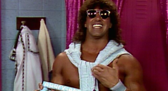 Rick Martel smiles into the camera, thinking of how good he would look in the WWE Hall of Fame.