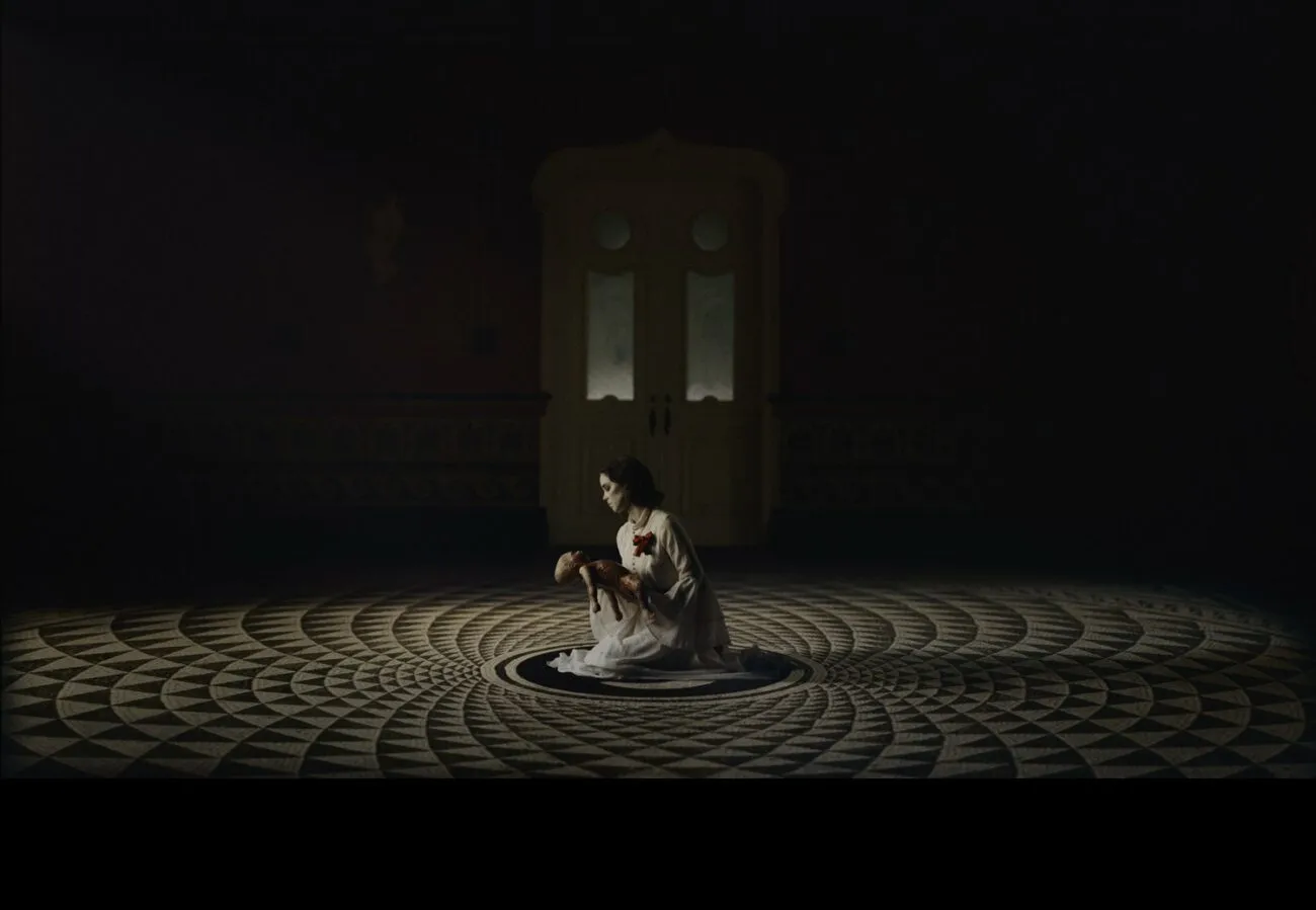 A woman holding a baby