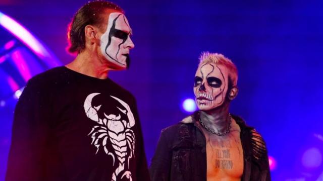Sting and Darby Allin share a tense glance