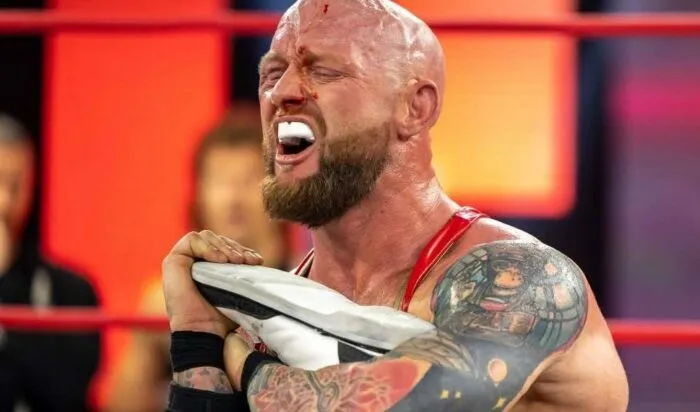 Josh Alexander locks in the ankle lock tight on an unfortunate, unseen opponent