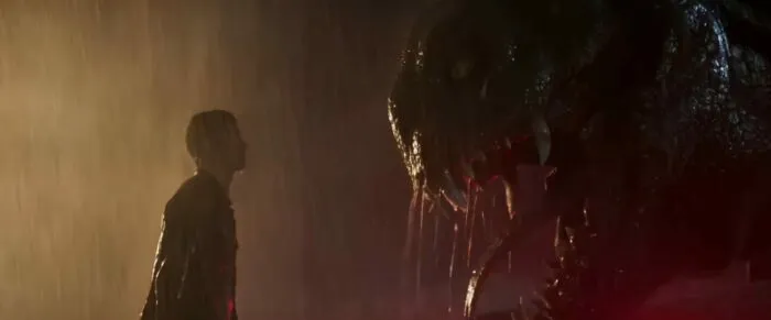 A man and a giant monster face to face