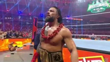 Roman Reign sizes up the crowd at WrestleMania