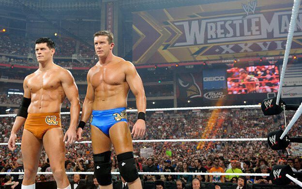 Cody Rhodes and Ted DiBiase Jr stand side-by-side at WrestleMania XXVI
