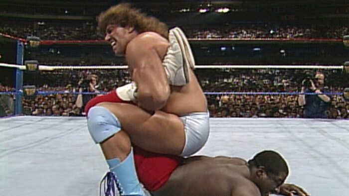 Rick Martel has Koko B. Ware in the Boston Crab at WrestleMania VI