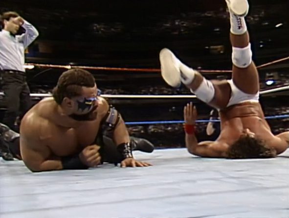 Tito Santana turns inside out after a Barbarian clothesline
