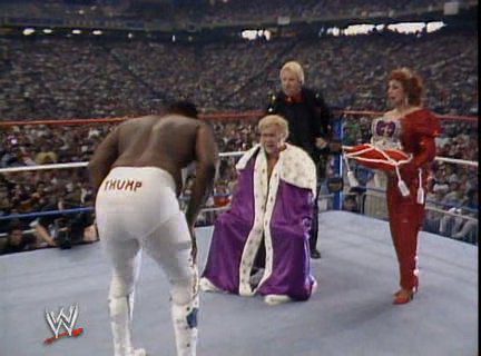 The Junkyard Dog bows to King Harley Race, Bobby Heenan and The Fabulous Moolah at WrestleMania III.