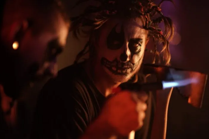 Silas holds a small blow torch in OFF RAMP