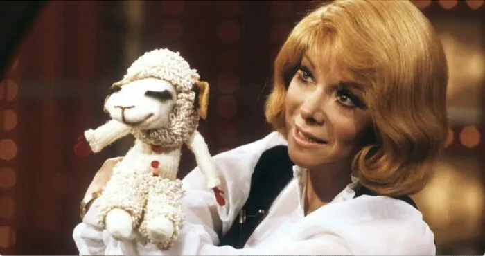 Shari Lews holds LAmb Chop