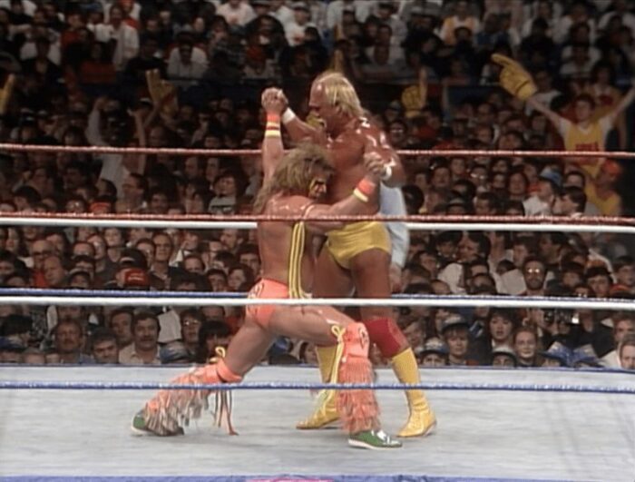 Hulk Hogan and The Ultimate Warrior engage in a test of strength