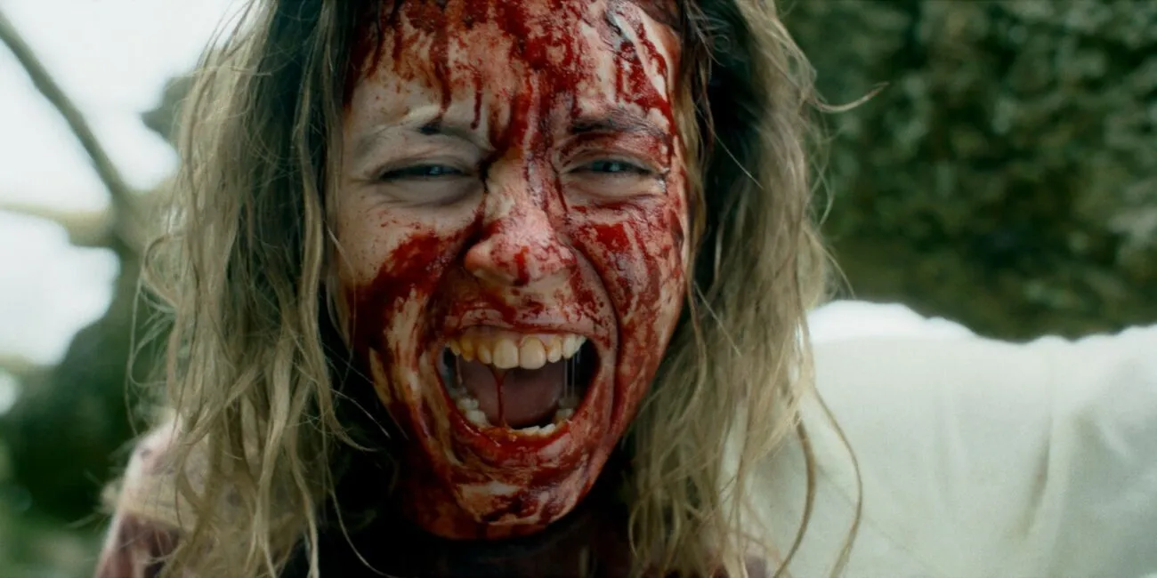 A woman with blood on her face