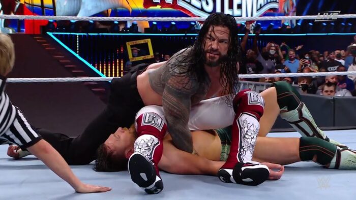 Roman Reigns covers both Daniel Bryan and Edge at the same time at WrestleMania 37