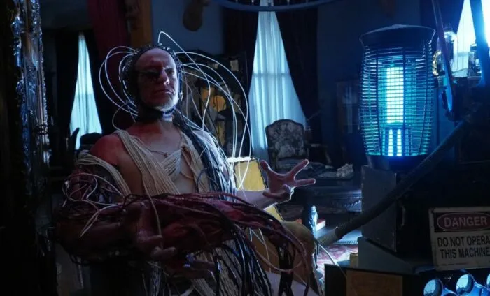 A man hooked up to all sorts of wires