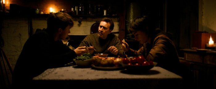 A father and his sons at the dinner table