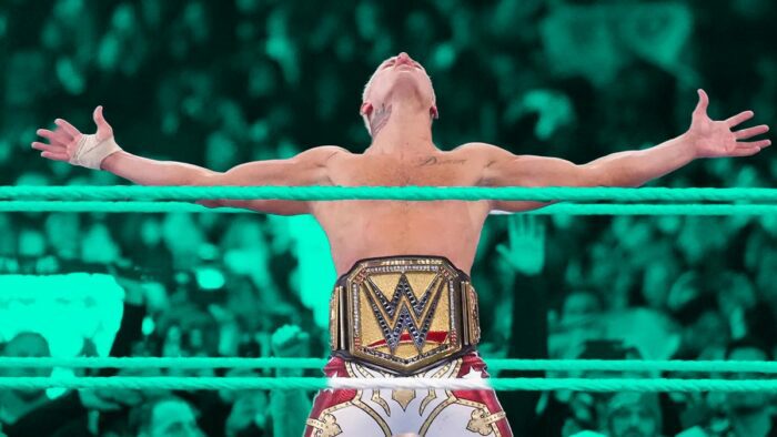 Cody Rhodes after winning the belt, arms outstretched