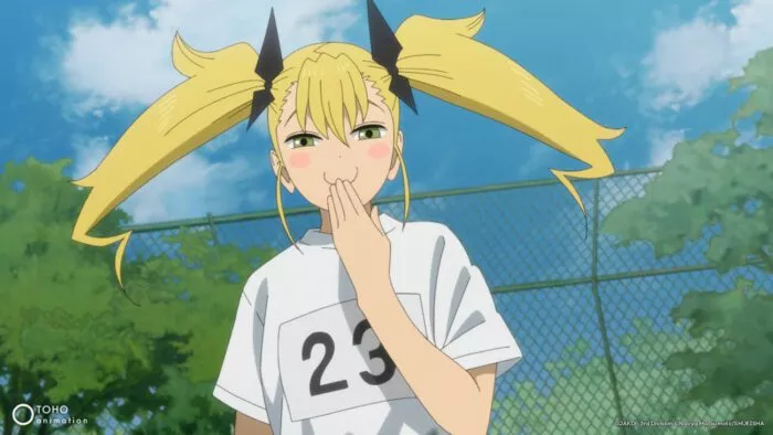 A girl stifling a laugh
