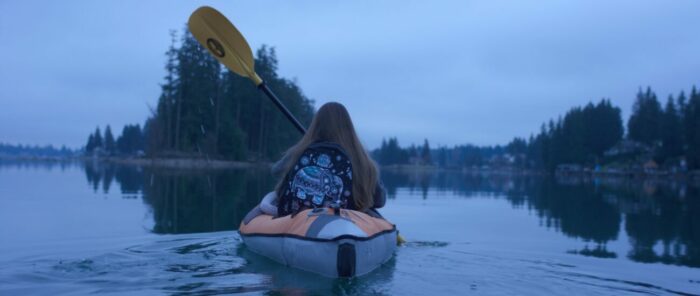 A girl on a rowboat