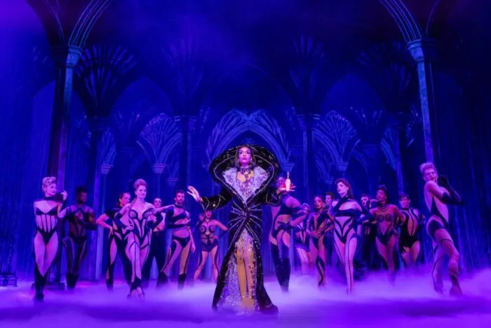 Viola Van Horn (Michelle Williams) sings with the ensemble of the musical, "Death Becomes Her."