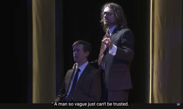 Mr. Davidson (Jeff Blim) sings to Paul Matthews (Jon Matteson), “A man so vague just can't be trusted," in the musical, “The Guy Who Didn’t Like Musicals.”