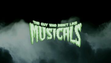 Green, spooky letters with green smoke billowing behind them spell the title, "The Guy Who Didn't Like Musicals."