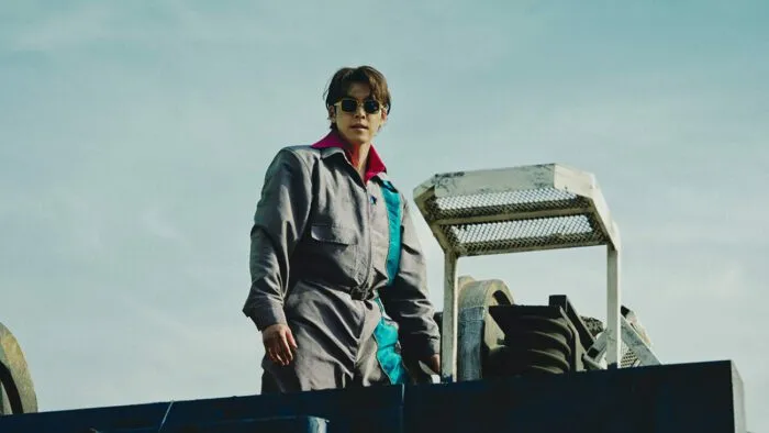 A man standing on a roof