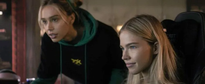 Two women looking at something