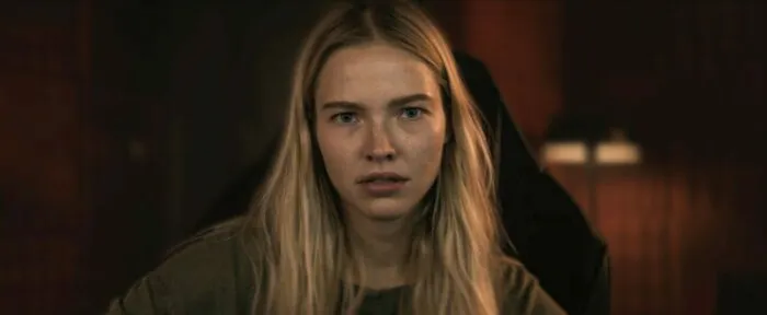 A woman looking at the camera