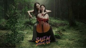 A forest setting where a woman is playing a half person, half cello with a bloody bow