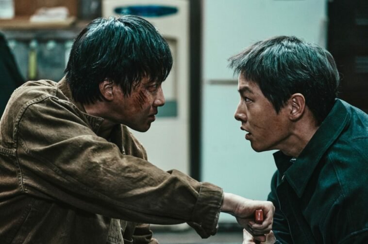 Two men facing off