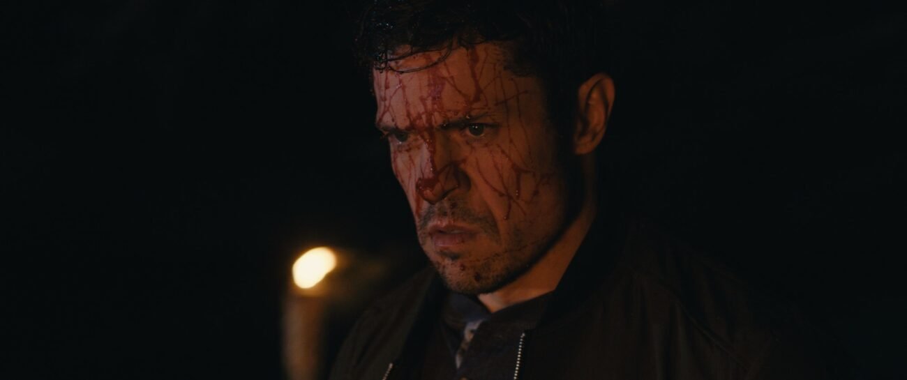 A man covered in blood