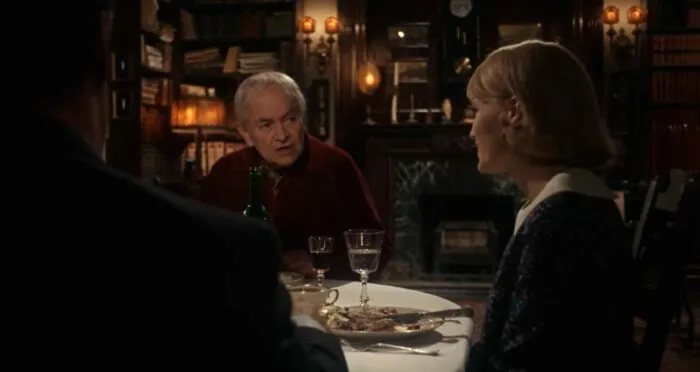 The Woodhouses and the Castevets having dinner