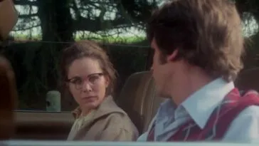 A man and a woman in a car