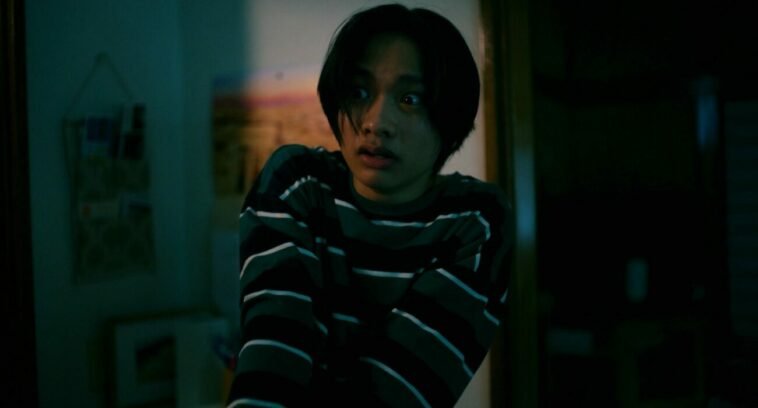 A boy looking terrified
