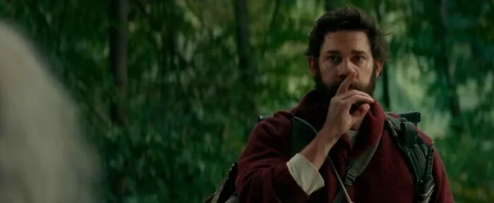 A man shushing someone