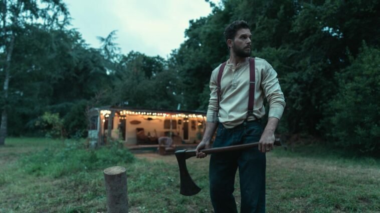 A man holding an axe.