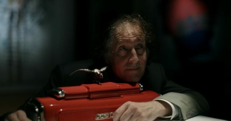 John holding the crumb catcher.