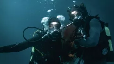 Two scuba divers in the water