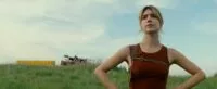 A woman standing in a field
