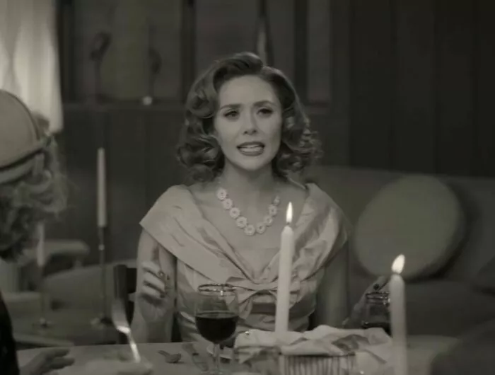 Wanda at a dinner table