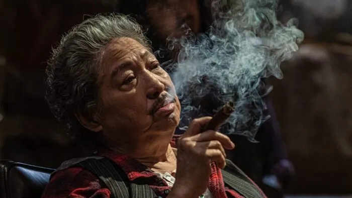 A man smoking a cigar