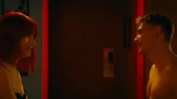 two people standing in front of each other