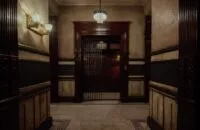 A hallway leading to an elevator