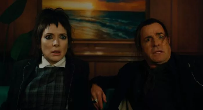 Two people looking scared