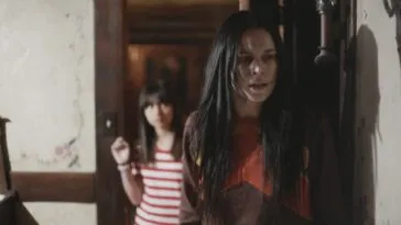 A mother and daughter looking scared