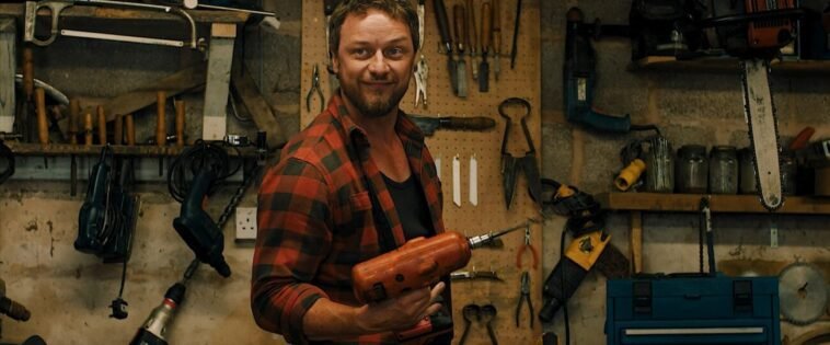 A man holding an electric drill
