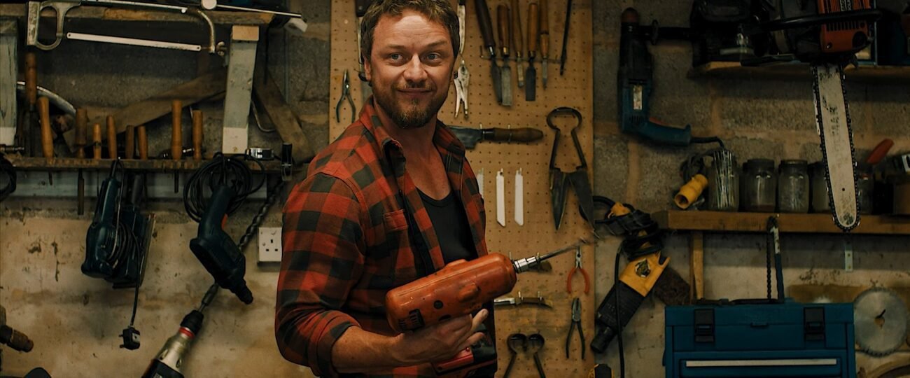 A man holding an electric drill