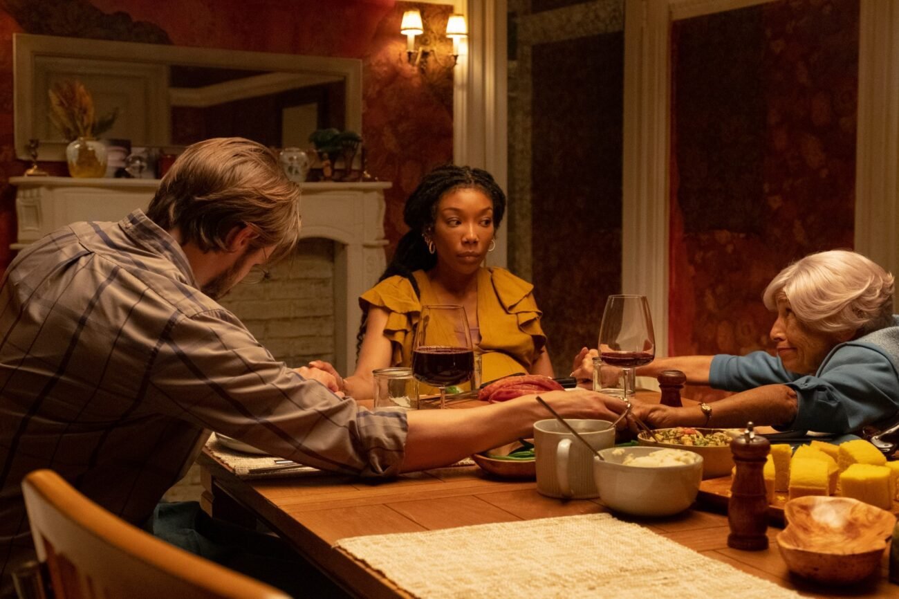 A family praying before a meal