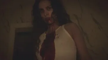 A woman with blood on her