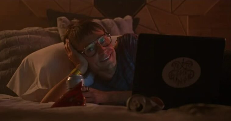 A man lying on his bed
