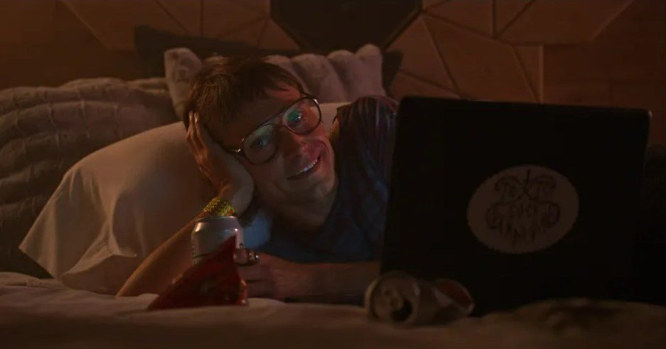 A man lying on his bed